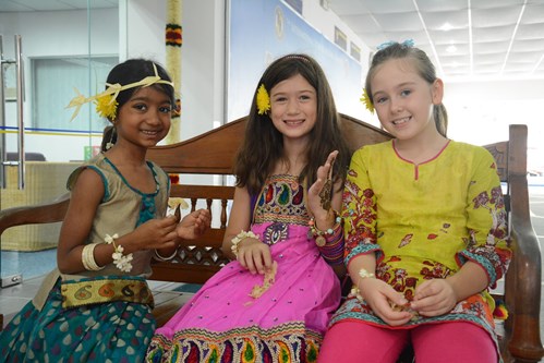 Diverse elementary students celebrating deepavali