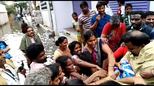 People of Chennai opening supplies sent by ISKL students