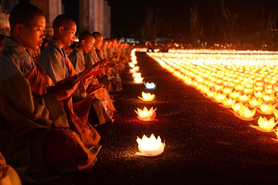 Buddhist monks praying