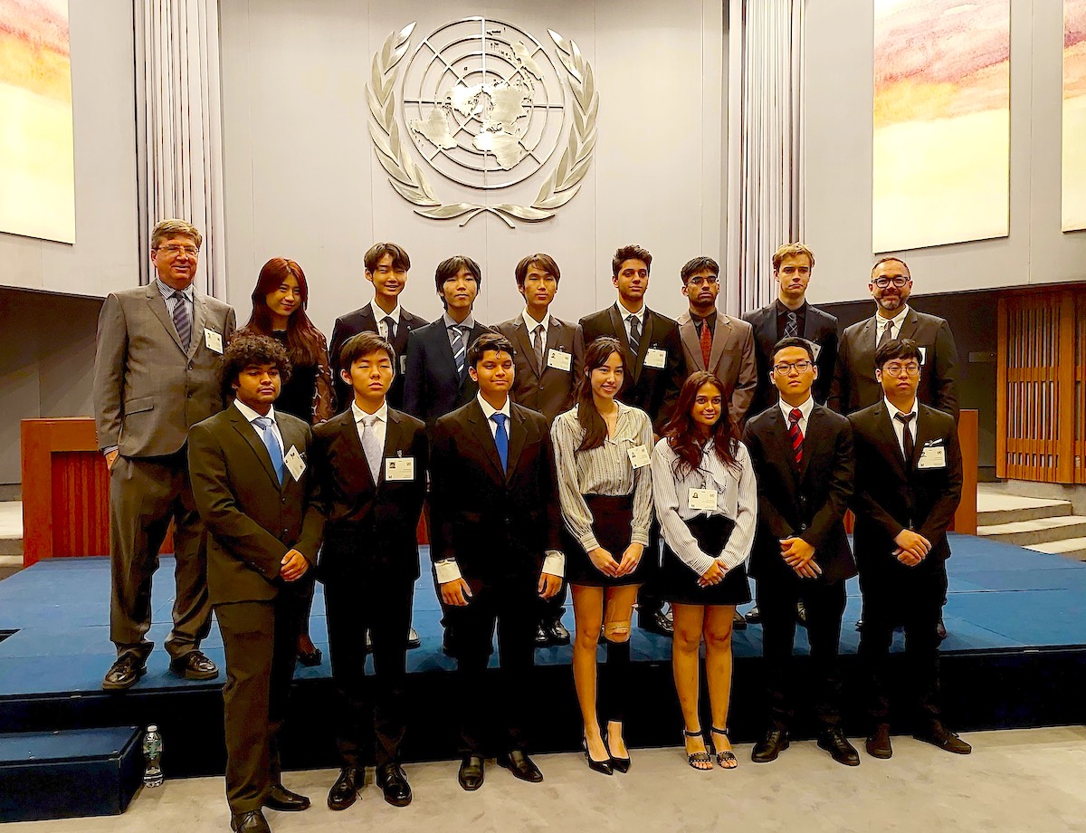 Group photo in the UN hall