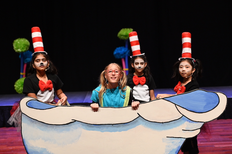 Elementary students singing during Seussical performance